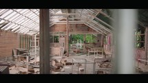 Nature's Reclaim: Abandoned Greenhouse Overrun by Nature