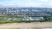 Aerial view of a huge power plant on the shore 