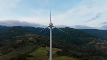 Wind turbine in a hilly landscape
