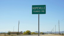 Town sign for Hopeville, Arizona