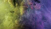 Colorful smoke gas and paint ink in motion,close up shot	