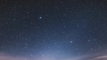 Blue night sky with stars and milky way galaxy Astronomy Time lapse background
