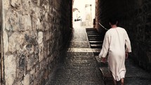 Jesus walking through the streets of Jerusalem 