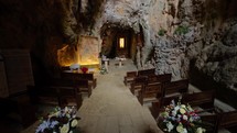 ancient Catholic church located in a natural cave