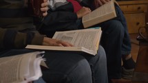 People study the Bible at a small group meeting at a home