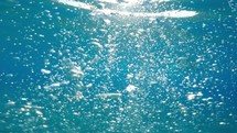 Air Bubbles Underwater. Background with copy space 