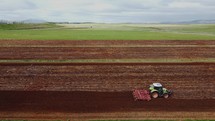 Tractor Cultivating process aerial view