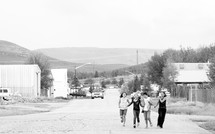 Kids walking on street in Colorado