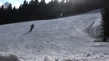 a man downhill skiing 