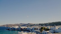 Mykonos town, Cyclades, Greece, to the Little Venice district during summer sunset time