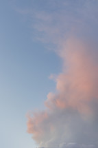 gentle pink clouds and sunset with blue evening sky