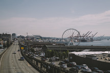 Ferris Wheel along a shore and road in Seattle 