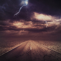 lightning storm over a highway 
