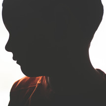 silhouette of a boy child 