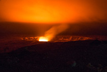 glow of heat and steam from volcano 