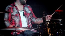 a man playing drums 