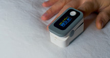 pulse oximeter and oxygen monitor on a finger 
