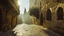 A Large main street in Jerusalem, Rome or another well-known biblical city.  A clean cobblestone street awaits the daily crowd and vendors. 