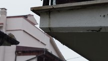 Rainwater Drips From The Balcony Of The House