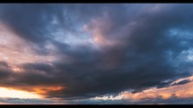 Magic evening sky at sunset Background Time lapse dramatic stormy clouds motion fast