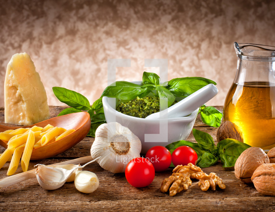 Italian pesto ingredients on wooden table