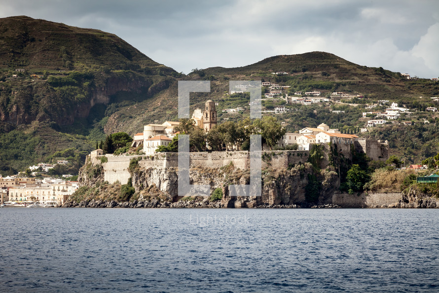 houses on cliffs along the shore of the Lipari Islands 