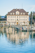 tax office and docked boats in Lindau Harbor 