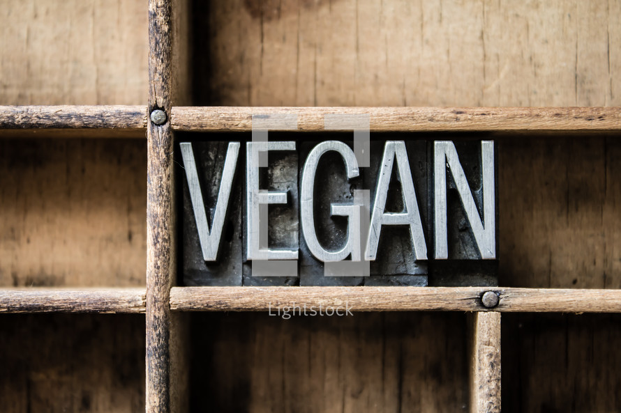 word vegan on a bookshelf 