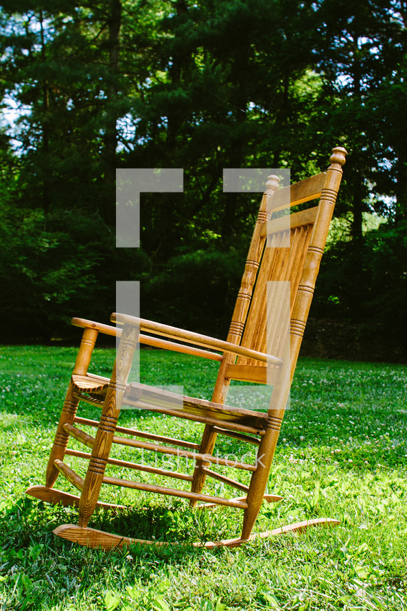 rocking chair in grass 