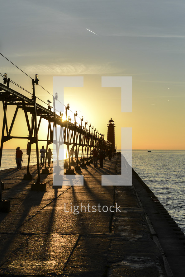 a pier and lighthouse 