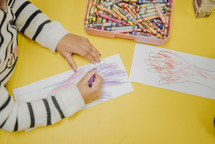 children coloring in a church nursery 