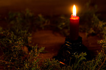 candle sticks with christmas greenery