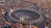 Flying around Arles arena romanesque amphitheater France sunrise ancient building