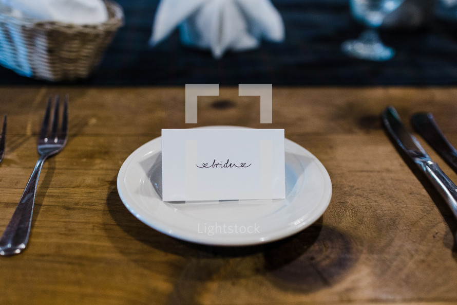bride place card at a wedding reception 