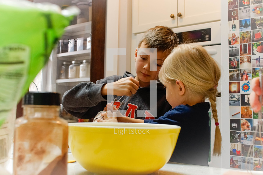 children cooking in a kitchen 