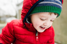 a child in a winter coat 