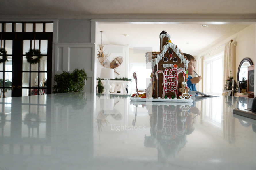 gingerbread house on a kitchen countertop 