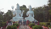 Hindu statues of Lord Shiva and Goddess Parvati at the Kailasagiri temple in Vizag Visakhapatnam, India.