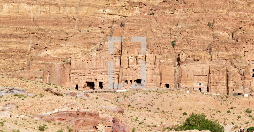 buildings carved into cliffs 