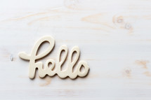 hello sign on white wood 