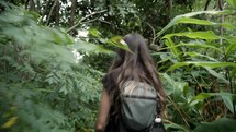 woman exploring the jungles of Hawaii 