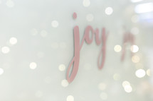 sparkly bokeh and decal of the word joy