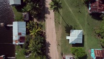 Aerial drone footage exploring homes on the coast of Honduras