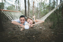 Couple on hammock in the forest