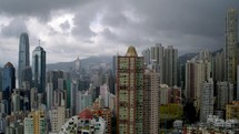 Cloudy storm day. Aerial view of Hong Kong city, financial and business district, China, Asia. 