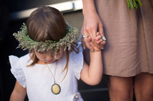 a flower girl and bridesmaid 
