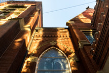 shadows on a brick church window 
