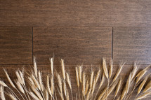 wheat border on a wood background 