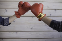 glove to glove, touching boxing gloves 