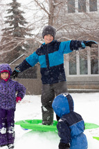children playing in snow 